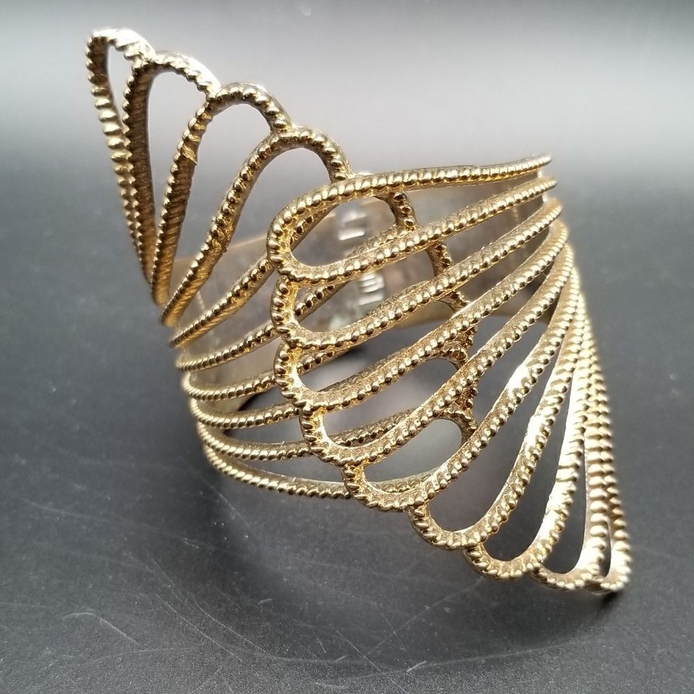 Laced angel wing whisper hinge bracelet. OFL